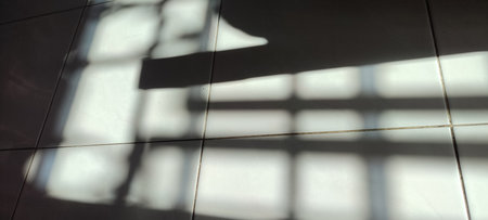 Shadow of a window on the wall. Sunlight through the window.の写真素材