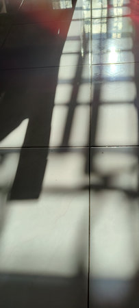 abstract of shadow on the floor and light from the window.の写真素材