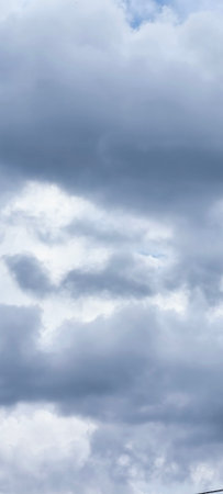 blue sky with cloud closeup. Sky background with clouds and sunの写真素材