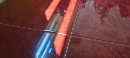 Close-up shot of red and blue ceramic tiles on a floor