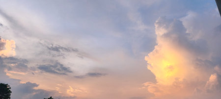 Cloudscape, Colored Clouds at Sunset near the Ocean in Summerの写真素材