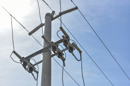 The wire at the top of the pole.