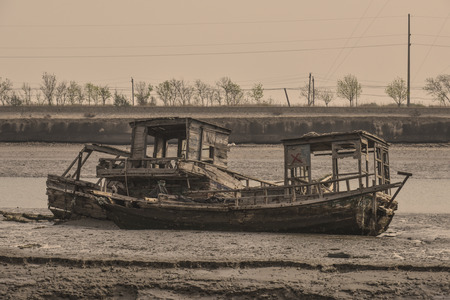 Luannan County, April 29th -2018, filmed on the coast of dilapidated ships, Luannan County, Hebei Province, Chinaの写真素材