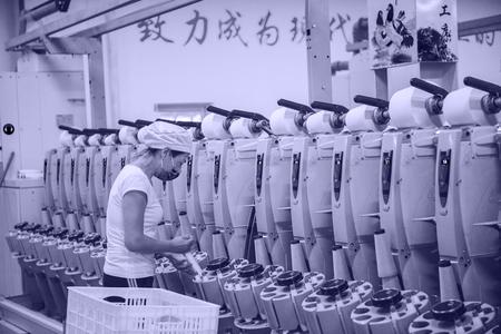 Textile Workshop Workers at Work in Textile Mill: Luannan County, Tangshan City, Hebei Province, China, Oct. 20, 2016のeditorial素材
