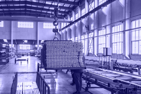 Mechanical equipment and finished products in workshop of aluminium alloy products factoryのeditorial素材