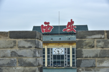 Bell Tower of Xi'an Railway Station outside the ancient city wall of Xi'an, Shaanxi Province, China. Chinese Translation: "Xi'an"のeditorial素材