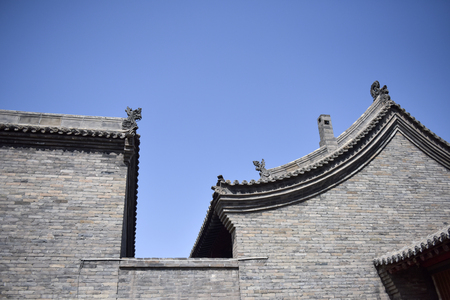 Ancient Chinese Architectural Gateway Wall under Clear Sky and White Cloud, Pingyao County, Jinzhong City, Shanxi Province, Chinaのeditorial素材