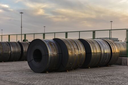 Large quantities of steel sheets to be transported at the dock yardの写真素材