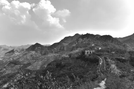 A close-up of the observation window of the beacon tower of the Great Wall, ancient China, in yumuling, Qianxi County, Hebei Province, China. Black and white monochrome.の写真素材