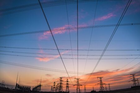 Contour of Transmission Tower at Sunset 