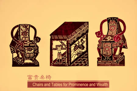Tangshan City, Hebei Province, China - November 16, 2018: the shadow puppet props of ancient Chinese drama preserved in the museum are translucent crafts carved with donkey skin.のeditorial素材