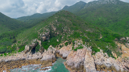 Aerial view of the sea and cliffs on the island of Koh Phangan, Thailandの写真素材