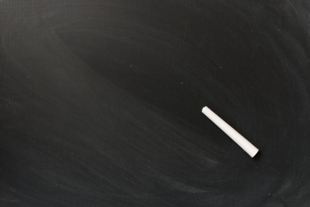 a chalk on blackboard backgroundの写真素材
