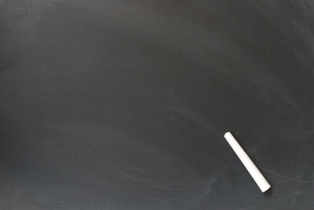 a chalk on blackboard backgroundの写真素材