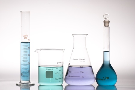 glass laboratory apparatus with color waterの写真素材