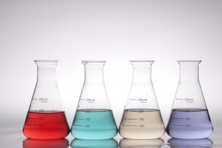 glass laboratory apparatus with color waterの写真素材