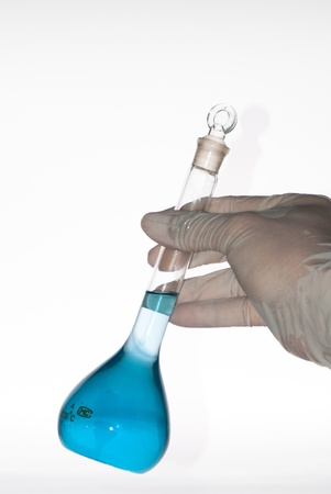 a measuring flask in handの写真素材