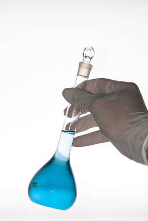 a measuring flask in handの写真素材