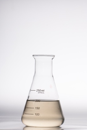 glass laboratory apparatus with color waterの写真素材
