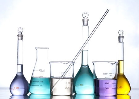 glass laboratory apparatus with color waterの写真素材
