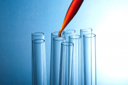 the Pipette put the solution to cuvetteの写真素材