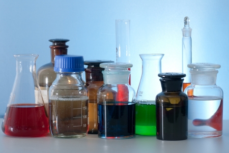 glass laboratory apparatus with color waterの写真素材