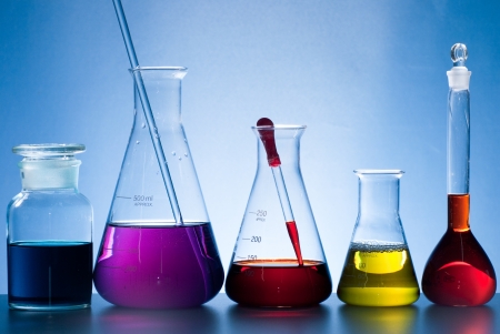 glass laboratory apparatus with color waterの写真素材