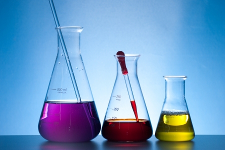 glass laboratory apparatus with color waterの写真素材