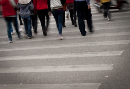 Busy city street people on zebra crossingの写真素材