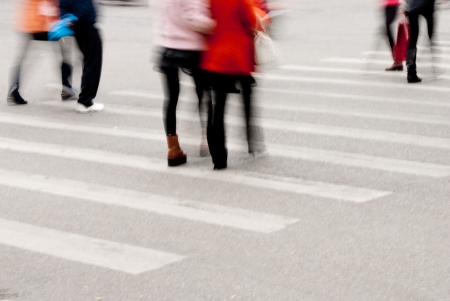 Busy city street people on zebra crossingの写真素材