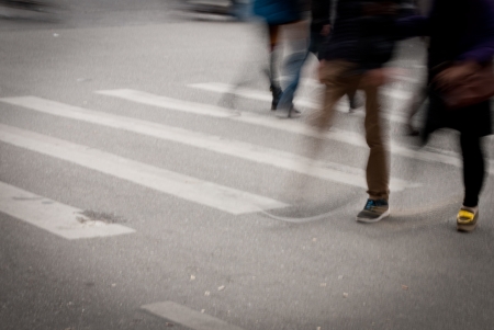 Busy city street people on zebra crossingの写真素材