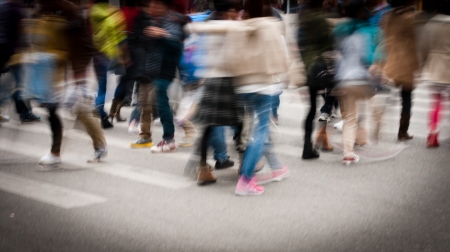 Busy city street people on zebra crossingの写真素材