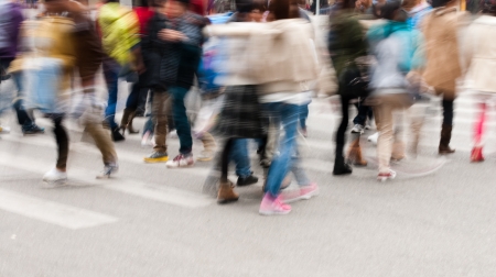 Busy city street people on zebra crossingの写真素材