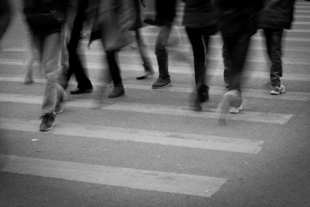 Busy city street people on zebra crossingの写真素材