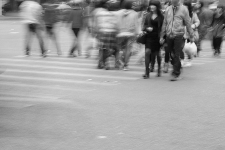 Busy city street people on zebra crossingの写真素材
