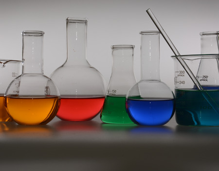 glass laboratory apparatus with color waterの写真素材