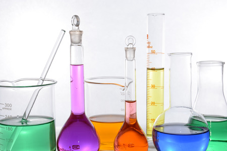 glass laboratory apparatus with color waterの写真素材
