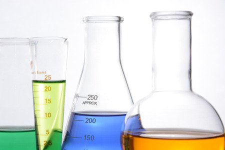 glass laboratory apparatus with color waterの写真素材