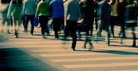 Busy city street people on zebra crossingの写真素材