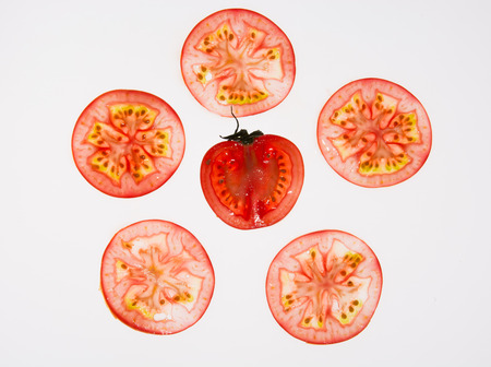 Some tomato slice isolated on white backgroundの写真素材