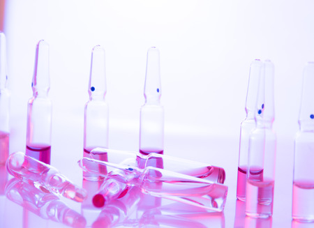 some ampoule in the deskの写真素材