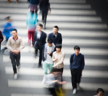 Busy city street people on zebra crossingのeditorial素材