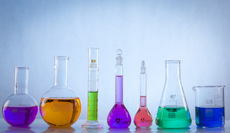 glass laboratory apparatus with color waterの写真素材
