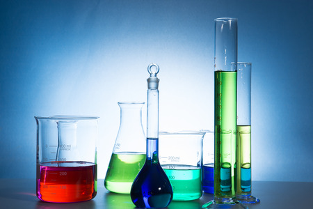 glass laboratory apparatus with color waterの写真素材