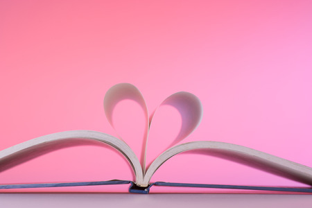 Heart Shaped Book on desk.の写真素材