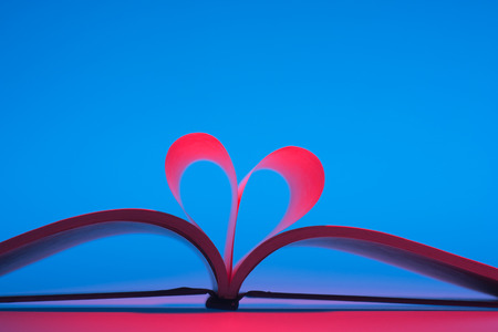 Heart Shaped Book on desk.の写真素材