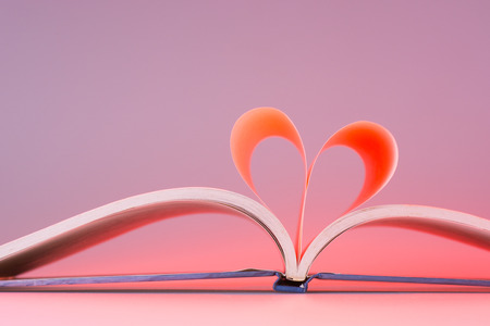 Heart Shaped Book on desk.の写真素材