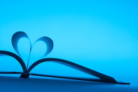 Heart Shaped Book on desk.の写真素材