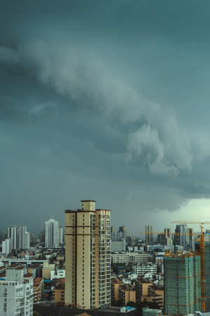 city with Dark clouds sceneryのeditorial素材