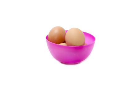 eggs in a purple bowlの写真素材